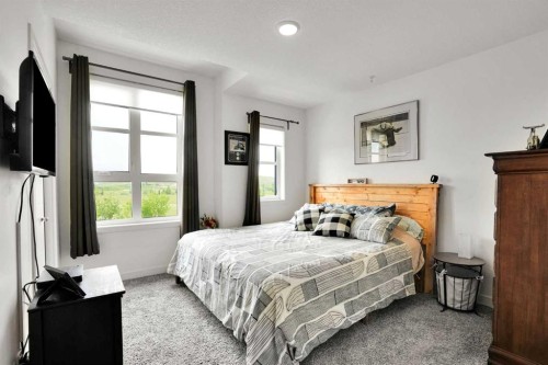 984 Walden Drive Se, Calgary, AB - Indoor Photo Showing Bedroom