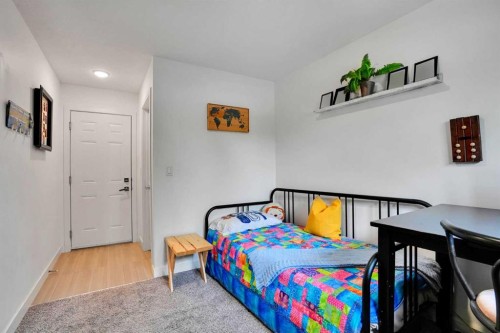 984 Walden Drive Se, Calgary, AB - Indoor Photo Showing Bedroom