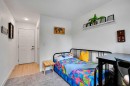 984 Walden Drive Se, Calgary, AB  - Indoor Photo Showing Bedroom 