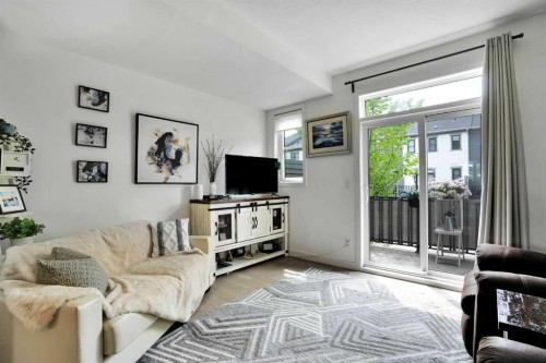 984 Walden Drive Se, Calgary, AB - Indoor Photo Showing Living Room