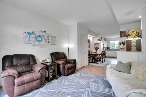984 Walden Drive Se, Calgary, AB - Indoor Photo Showing Living Room