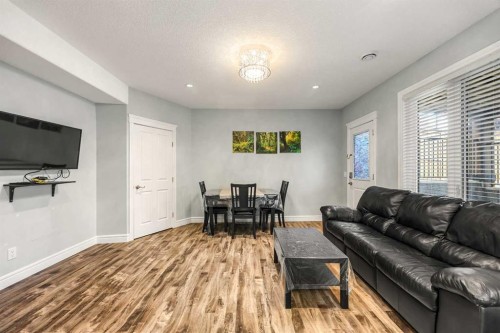 183 Aspen Acres Manor Sw, Calgary, AB - Indoor Photo Showing Living Room