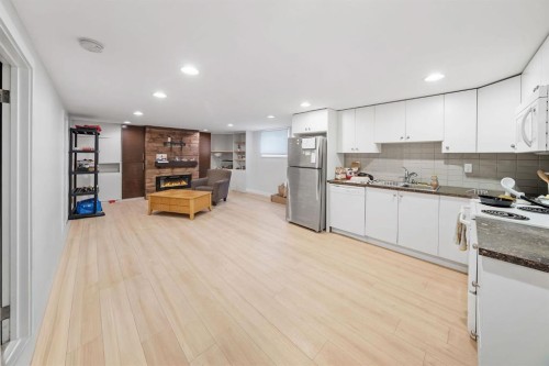 703 Millar Road Ne, Calgary, AB - Indoor Photo Showing Kitchen With Double Sink