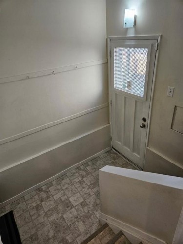 703 Millar Road Ne, Calgary, AB - Indoor Photo Showing Other Room