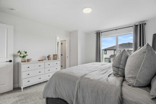 62 Southborough Crescent, Cochrane, AB - Indoor Photo Showing Bedroom