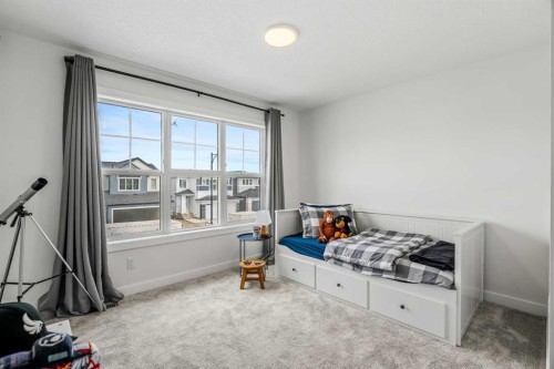 62 Southborough Crescent, Cochrane, AB - Indoor Photo Showing Bedroom