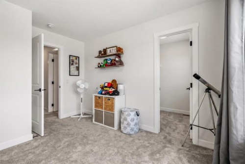 62 Southborough Crescent, Cochrane, AB - Indoor Photo Showing Other Room
