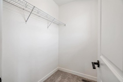 62 Southborough Crescent, Cochrane, AB - Indoor With Storage
