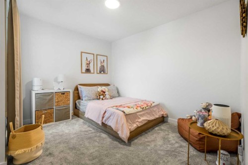 62 Southborough Crescent, Cochrane, AB - Indoor Photo Showing Bedroom
