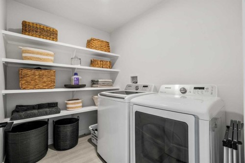 62 Southborough Crescent, Cochrane, AB - Indoor Photo Showing Laundry Room