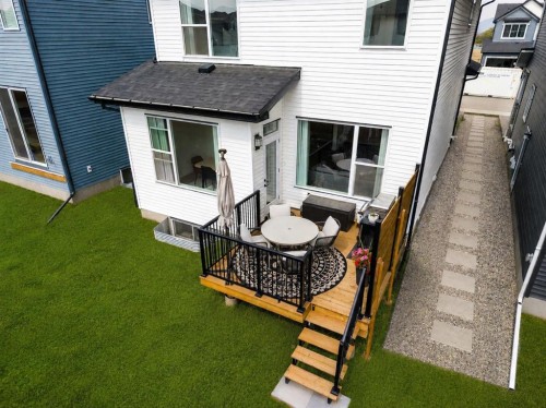 62 Southborough Crescent, Cochrane, AB - Outdoor With Deck Patio Veranda With Exterior