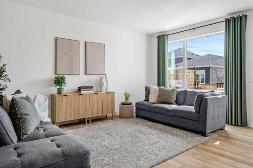 62 Southborough Crescent, Cochrane, AB - Indoor Photo Showing Living Room