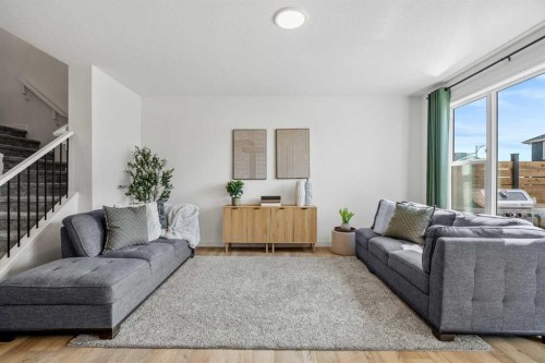 62 Southborough Crescent, Cochrane, AB - Indoor Photo Showing Living Room