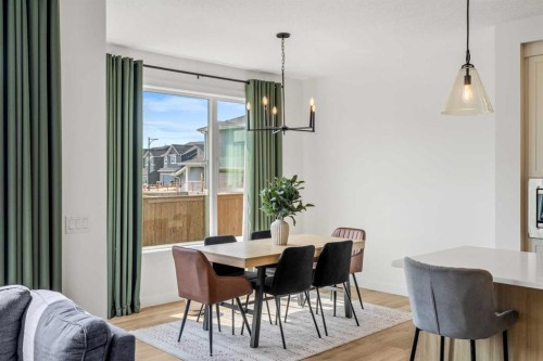 62 Southborough Crescent, Cochrane, AB - Indoor Photo Showing Dining Room