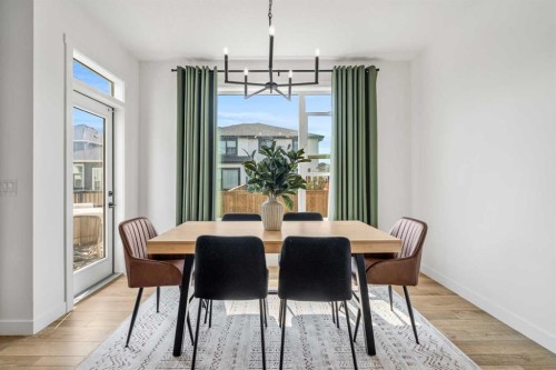 62 Southborough Crescent, Cochrane, AB - Indoor Photo Showing Dining Room