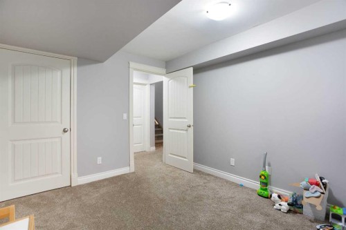1153 Kingston Crescent Se, Airdrie, AB - Indoor Photo Showing Other Room