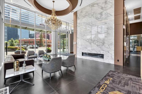 302-738 1 Avenue Sw, Calgary, AB - Indoor With Fireplace