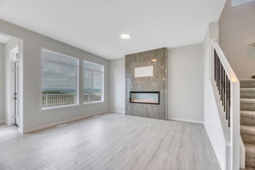 63 Setonvista Grove Se, Calgary, AB - Indoor With Fireplace