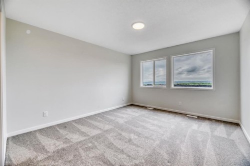 63 Setonvista Grove Se, Calgary, AB - Indoor Photo Showing Other Room