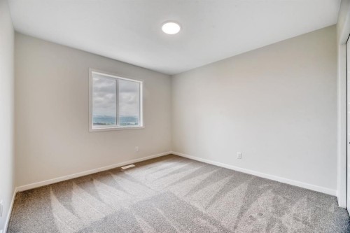 63 Setonvista Grove Se, Calgary, AB - Indoor Photo Showing Other Room