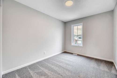 63 Setonvista Grove Se, Calgary, AB - Indoor Photo Showing Other Room