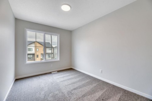 63 Setonvista Grove Se, Calgary, AB - Indoor Photo Showing Other Room