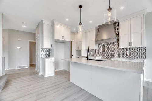 63 Setonvista Grove Se, Calgary, AB - Indoor Photo Showing Kitchen With Upgraded Kitchen
