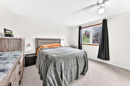 983 Rundlecairn Way Ne, Calgary, AB - Indoor Photo Showing Bedroom