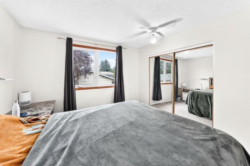 983 Rundlecairn Way Ne, Calgary, AB - Indoor Photo Showing Bedroom