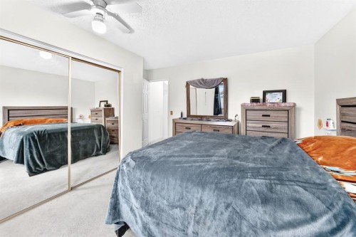 983 Rundlecairn Way Ne, Calgary, AB - Indoor Photo Showing Bedroom