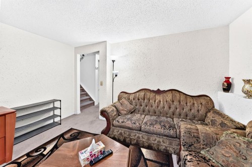 983 Rundlecairn Way Ne, Calgary, AB - Indoor Photo Showing Living Room