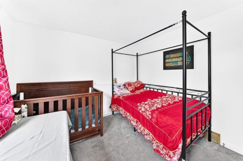 983 Rundlecairn Way Ne, Calgary, AB - Indoor Photo Showing Bedroom