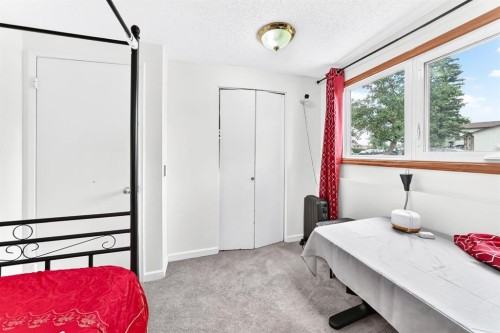 983 Rundlecairn Way Ne, Calgary, AB - Indoor Photo Showing Bedroom