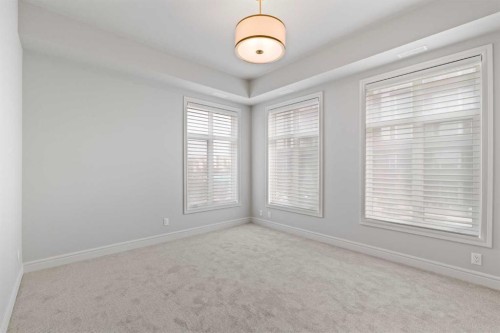 203-275 Lebel Crescent Nw, Calgary, AB - Indoor Photo Showing Other Room