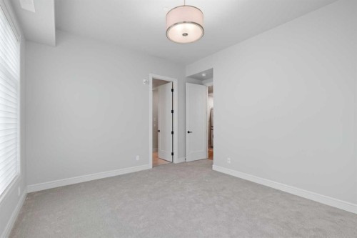 203-275 Lebel Crescent Nw, Calgary, AB - Indoor Photo Showing Other Room