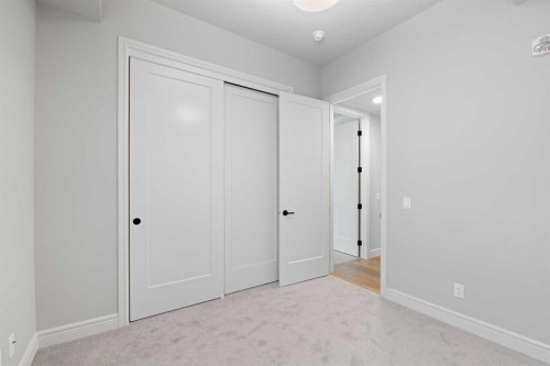 203-275 Lebel Crescent Nw, Calgary, AB - Indoor Photo Showing Other Room