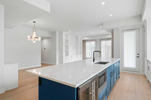 203-275 Lebel Crescent Nw, Calgary, AB - Indoor Photo Showing Kitchen With Upgraded Kitchen