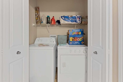 77 Saddleland Drive Ne, Calgary, AB - Indoor Photo Showing Laundry Room