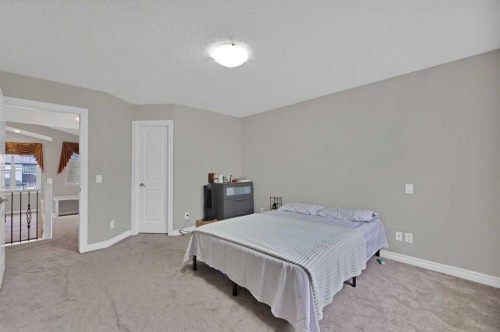 77 Saddleland Drive Ne, Calgary, AB - Indoor Photo Showing Bedroom