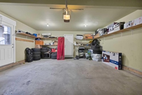 77 Saddleland Drive Ne, Calgary, AB - Indoor Photo Showing Garage
