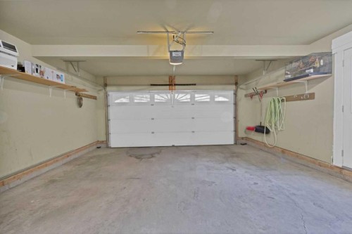 77 Saddleland Drive Ne, Calgary, AB - Indoor Photo Showing Garage
