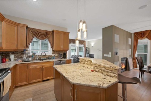 77 Saddleland Drive Ne, Calgary, AB - Indoor Photo Showing Kitchen With Double Sink