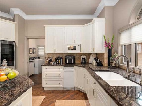 39 Baycrest Court Sw, Calgary, AB - Indoor Photo Showing Kitchen With Double Sink