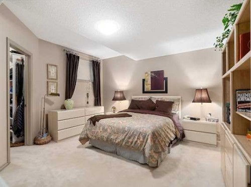 39 Baycrest Court Sw, Calgary, AB - Indoor Photo Showing Bedroom