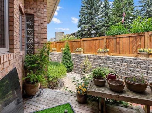 39 Baycrest Court Sw, Calgary, AB - Outdoor With Deck Patio Veranda