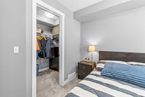 145 Cranford Walk Se, Calgary, AB - Indoor Photo Showing Bedroom