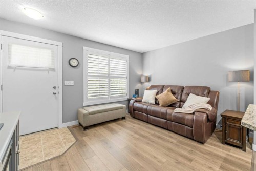 145 Cranford Walk Se, Calgary, AB - Indoor Photo Showing Living Room