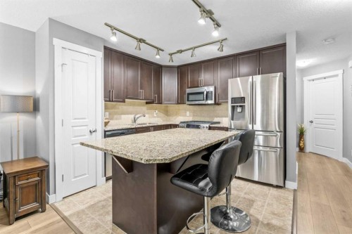 145 Cranford Walk Se, Calgary, AB - Indoor Photo Showing Kitchen With Stainless Steel Kitchen With Upgraded Kitchen