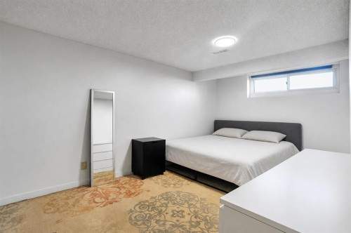 888 Rundlecairn Way Ne, Calgary, AB - Indoor Photo Showing Bedroom