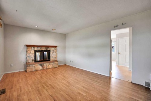 888 Rundlecairn Way Ne, Calgary, AB - Indoor Photo Showing Living Room